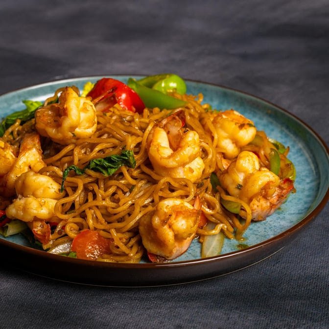 Generous portions of noodles, rice, and shellfish.