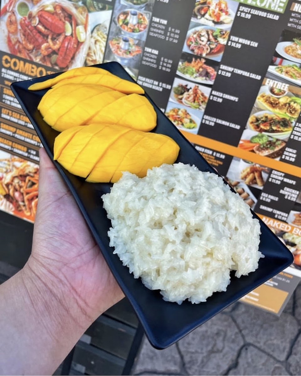 Restaurant menu featuring shrimp, salmon, and fried rice.